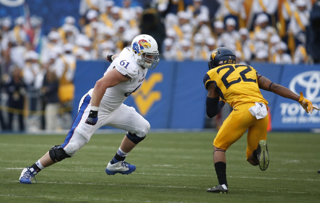 Jarrod Harper looks to make a play against the Kansas Jayhawks