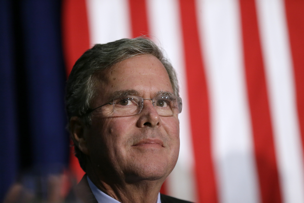 Republican presidential candidate Jeb Bush waits on stage in Davenport Iowa. For months Bush’s campaign insisted it was too early. But with just over three months until primary voting gets underway in Iowa and Bush still mired in the middle of the