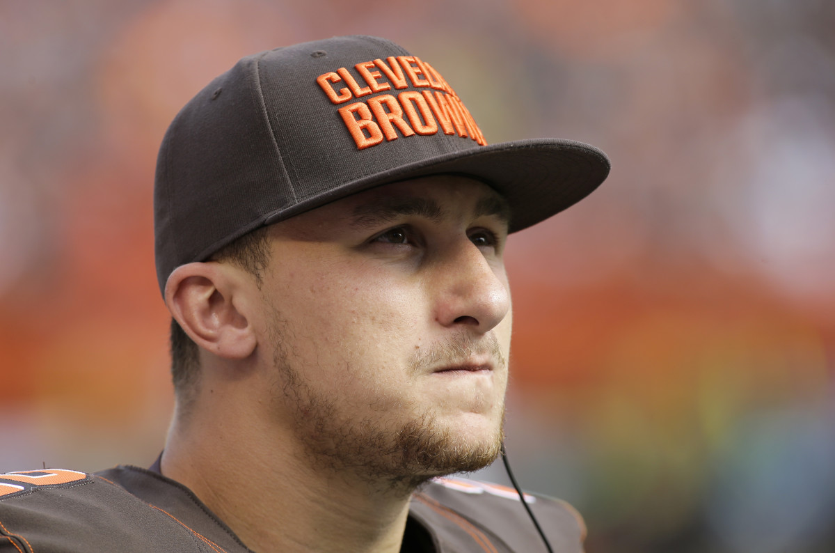 Cleveland Browns quarterback Johnny Manziel watches from the sidelines during the second half of an NFL football game against the Oakland Raiders in Cleveland. When an NFL team is forced to use its backup quarterback whether because of injury or poor per