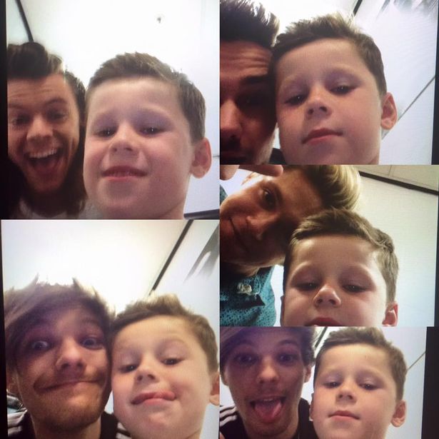 Kai Rooney poses for selfies with members of One Direction