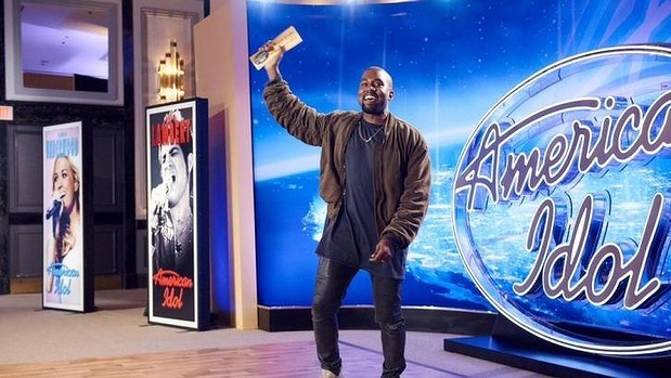 Kanye West with his'ticket to Hollywood after auditioning on American Idol