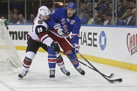 Doan fights for the puck with New York Rangers Ryan Mc Donagh during the first period of an NHL hockey game Thursday Oct. 22 2015 in New York