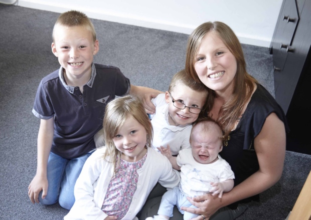 Kelly Johnson with her children Ava 11 weeks Alfie four April six and Daniel eight