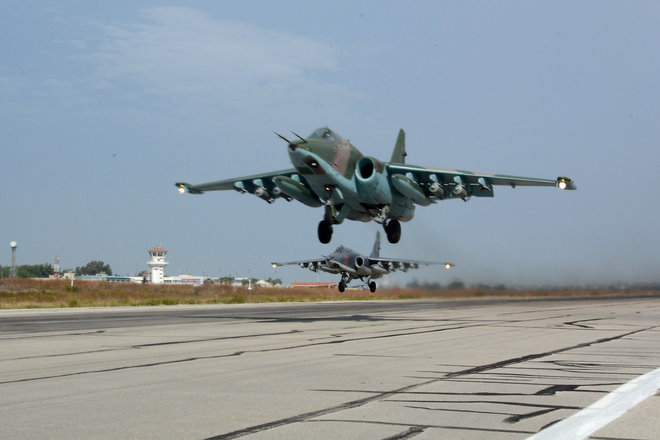 Russian Su-25 jets takes off for a mission from Hemeimeem airbase Syria on Thursday Oct. 22 2015. Since early morning Russian combat jets have been taking off from this base in western Syria heading for missions. 2 Rus