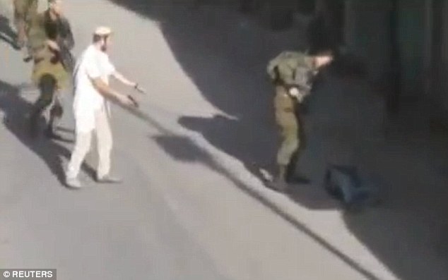 Police at the site of Saturday's stabbing in Jerusalem. There have been three stabbing attacks in Jerusalem and Hebron since Saturday morning