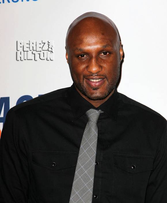 Lamar Odom 'fighting for his life' after being found unconscious at brothel