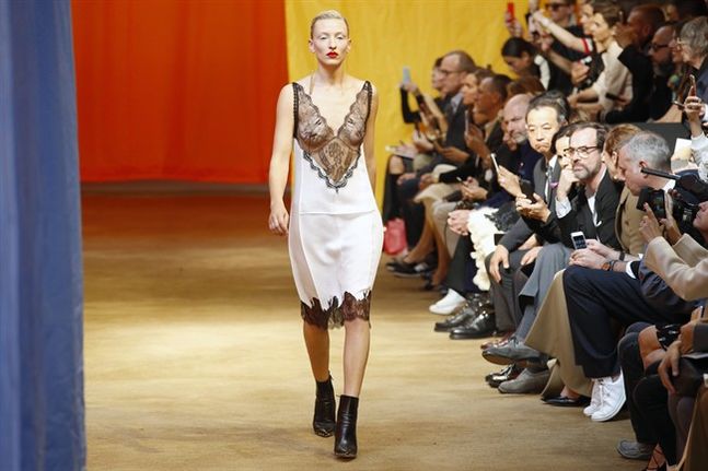 EDS NOTE: NUDITY- A model wears a creation for Celine's Spring Summer 2016 ready-to-wear fashion collection presented during the Paris Fashion Week in Paris Sunday Oct. 4 2015