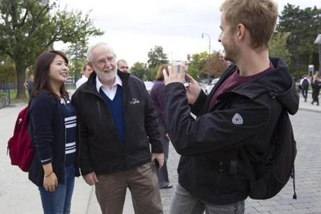 Arthur B. Mc Donald posed with students at Queen’s University in Kingston Ontario Tuesday