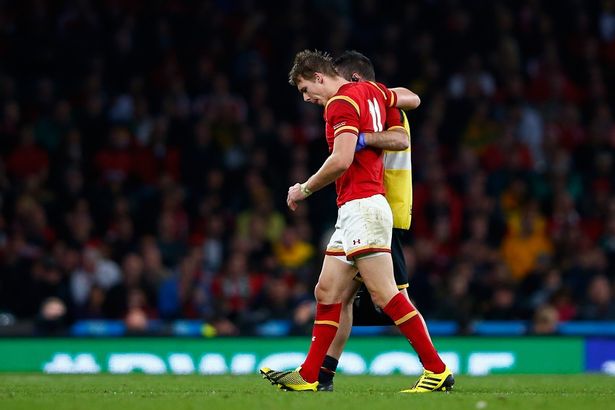 Liam Williams hobbles off