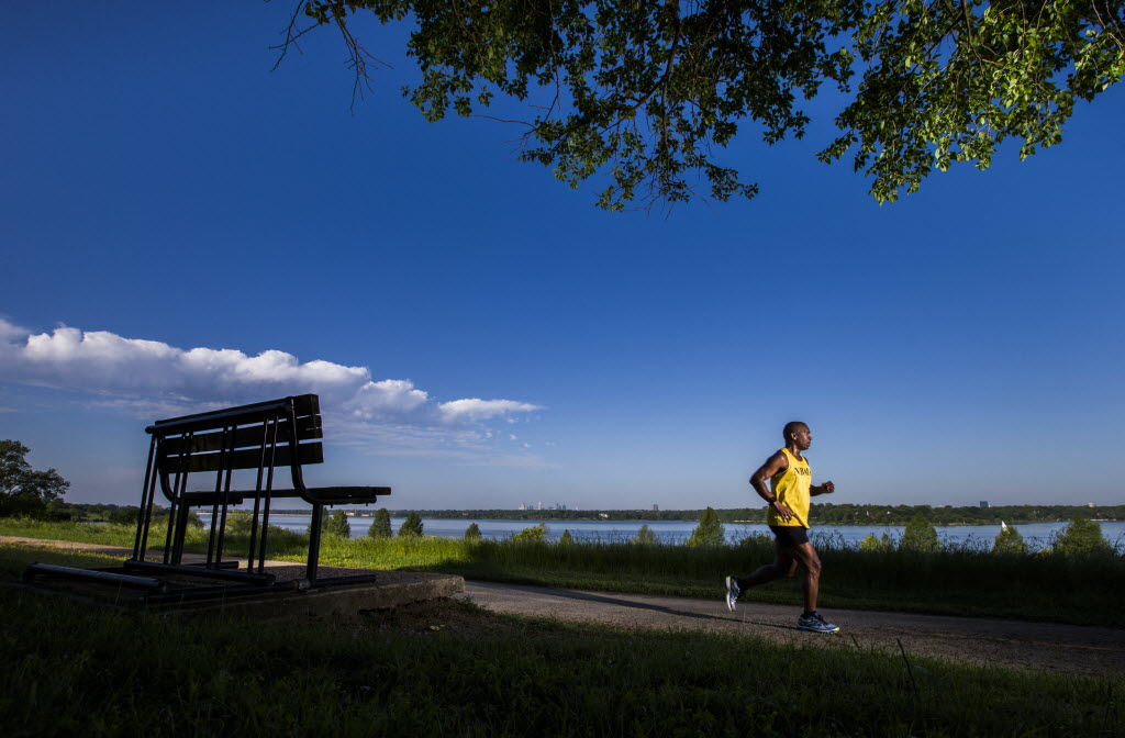 Marathon runner Tony Reed runs on the White Rock Lake Trail on Sunday