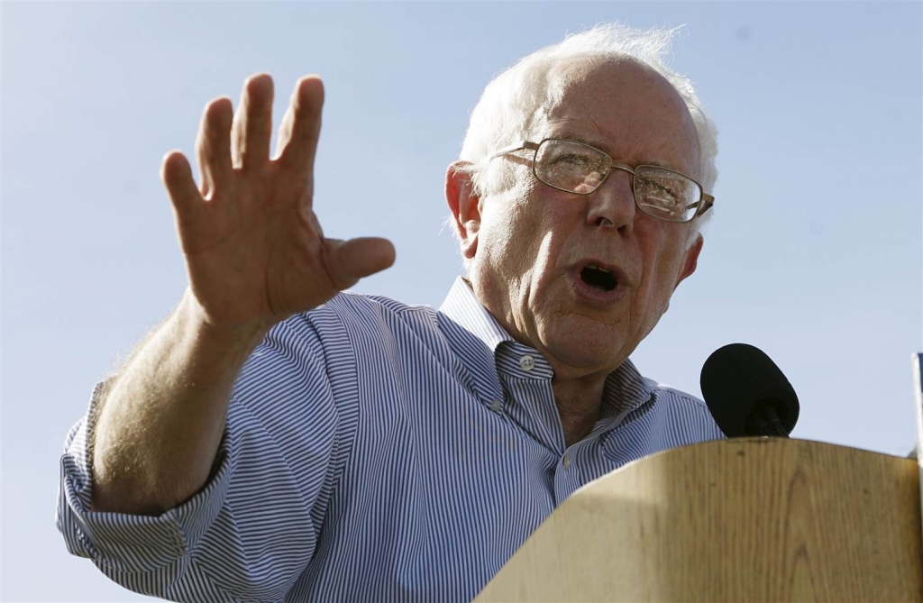 Image Democratic presidential candidate Bernie Sanders speaks to a crowd against a Rocky Mountain backdrop at the University of Colorado in Boulder