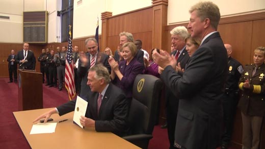 Terry McAuliffe to ban guns in some state buildings, tighten enforcement