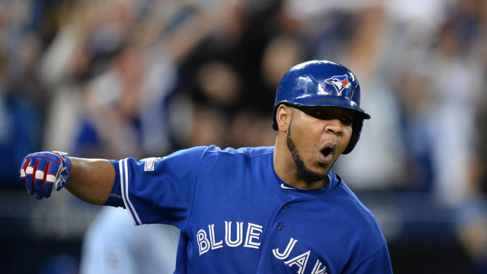 Toronto Blue Jays Edwin Encarnacion rounds the bases on a solo home run during the sixth inning in Game 5 of baseball's American League Division Series against the Texas Rangers Wednesday Oct. 14 2015 in Toronto. (Chris Young  The Canadian Press via AP