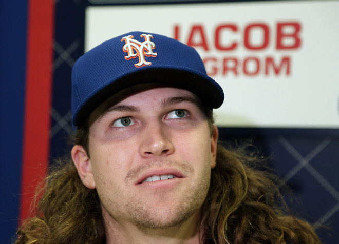 New York Mets starting pitcher Jacob de Grom talks during media day for the Major League Baseball World Series against the Kansas City Royals Monday Oct. 26 2015 in Kansas City Mo. New York Mets starting pitcher Noah Syndergaa