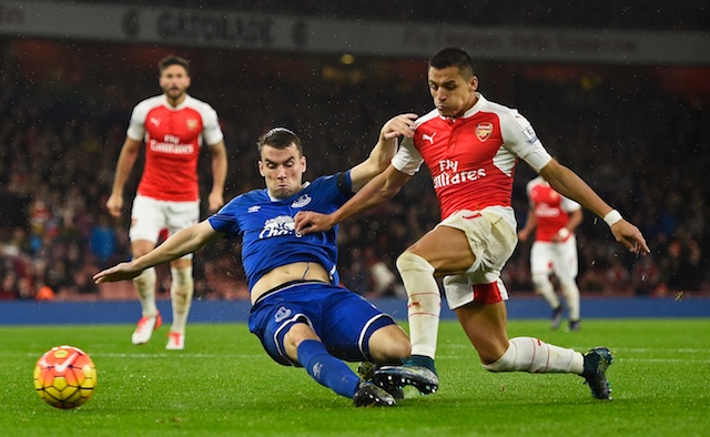 Everton's Seamus Coleman in action with Arsenal's Alexis Sanchez