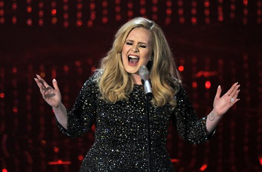 Adele performs during the Oscars at the Dolby Theatre in Los Angeles. NBC said Friday Oct. 30 2015 that the singer will tape a concert at New York's Radio City Music Hall in November to be shown in a one