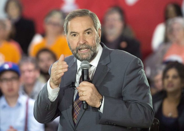 NDP leader Tom Mulcair speaks to supporters a town hall meeting Thursday