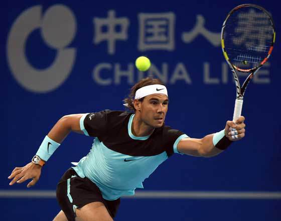 Rafael Nadal of Spain hits a return against Vasek Pospisil of Canada during their second round men’s singles match at the China Open tennis tournament in Beijing on Wednesday. AFP