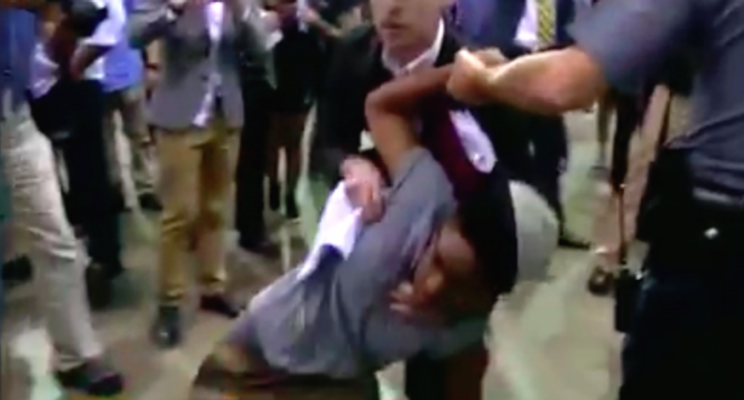 Fight Breaks Out at Donald Trump Rally as Supporter Spits in Protester's Face