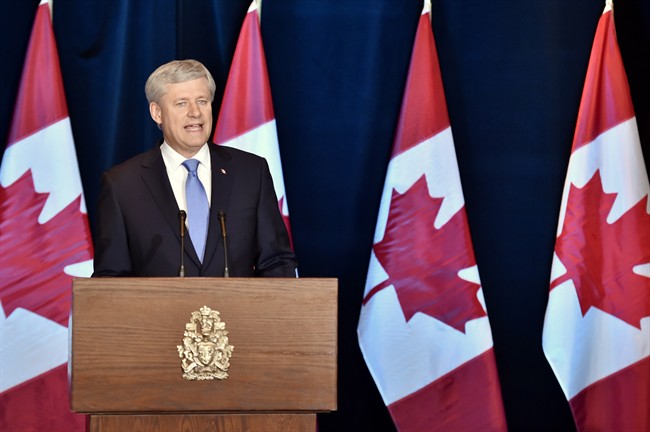 Prime Minister Stephen Harper speaks about the Trans Pacific Partnership trade deal at a press conference in Ottawa on Monday