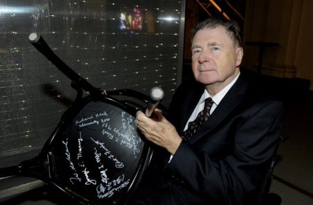 Richard F. Heck of the U.S. the 2010 Nobel Chemistry co-laureate holds up a chair after signing under its seat at the Nobel Museum in Stockholm December 6 2010. REUTERS  Janerik Henriksson  Scanpix Sweden