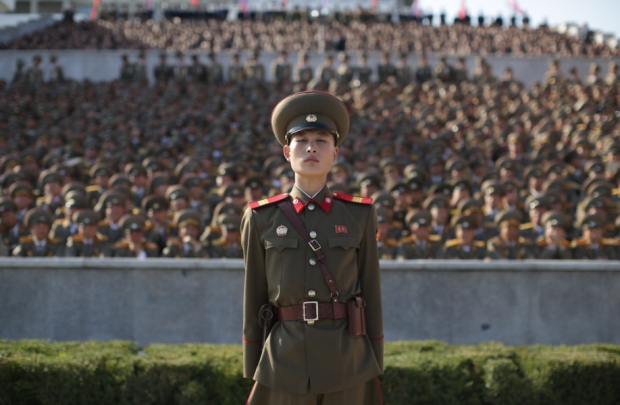 A North Korean soldier stands at a parade in Pyongyang