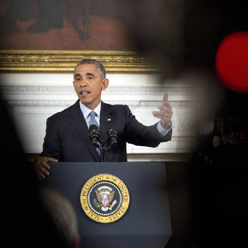 Obama gestures as he answers question during a news conference in the State Dining Room of the White House in Washington Friday Oct. 2 2015