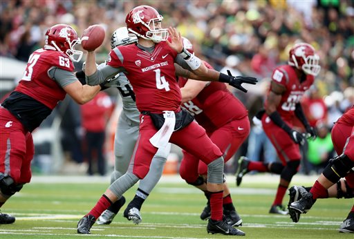 Washington State quarterback Luke Falk looks to throw the football during the first half of an NCAA college football game against Oregon Saturday Oct. 10 2015 in Eugene Ore