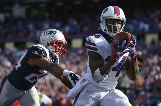 Sammy Watkins #14 of the Buffalo Bills catches a touchdown in the end zone during NFL game action as Bradley Fletcher #24 of the New England Patriots covers him at Ralph Wilson Stadium