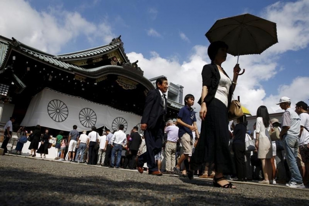 Japan's Abe sends ritual offering to Yasukuni Shrine ahead of trilateral summit