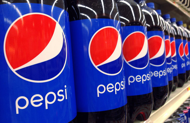 Pepsi bottles are on display at a supermarket in Haverhill Mass. Pepsico reports quarterly financial results on Tuesday Oct. 6 2015