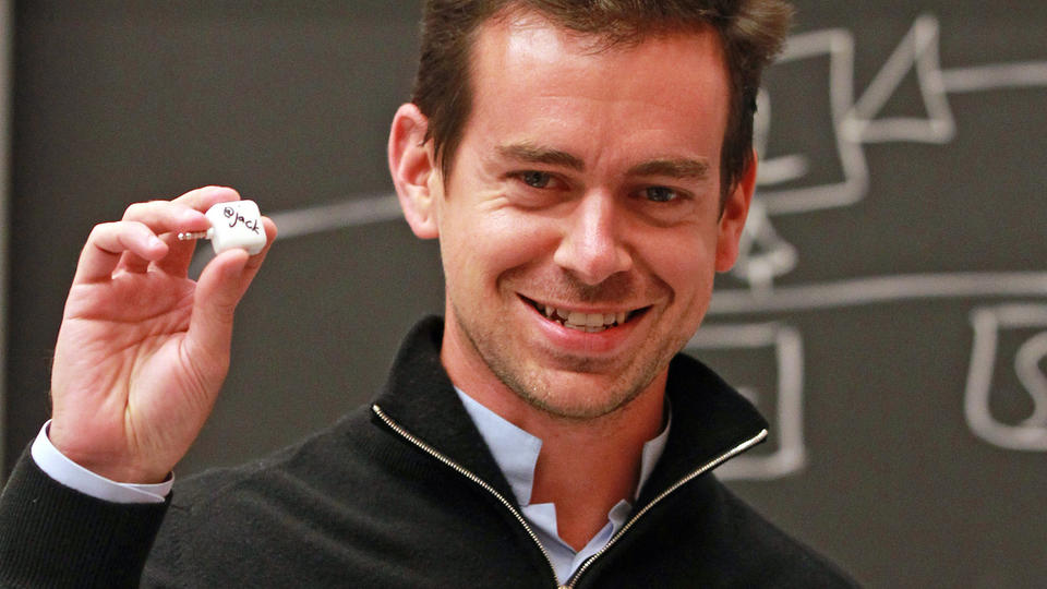 OLD SCHOOL At MIT Jack Dorsey autographs a card reader for Square his new company with his @Jack Twitter handle. File