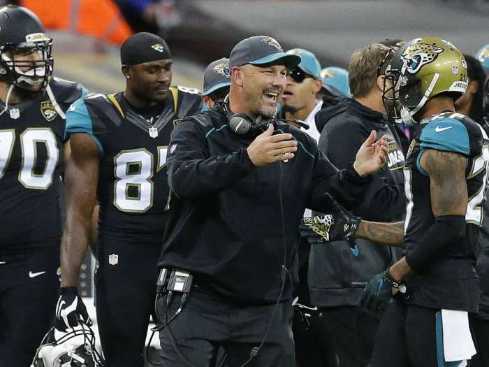 Jaguars coach Gus Bradley congratulates players during the team's victory over the Bills in London. AP  Matt Dunham