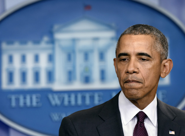 President Barack Obama pauses as he speaks in the Brady Press Briefing Room at the White House in Washington Thursday Oct. 1 2015 about the shooting at the community college in Oregon. The shooting happened at Umpqua Community College in Roseburg Ore