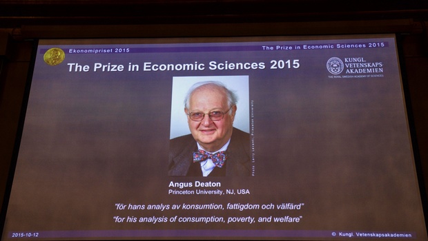 A view of the screen showing an image of Professor Angus Deaton winner of the 2015 Sveriges Riksbank Prize in Economic Sciences in Memory of Alfred Nobel. | AP