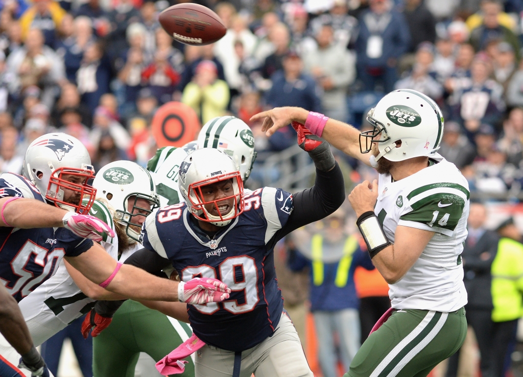 Jets quarterback Ryan Fitzpatrick right throws a pass during the second quarter against the Patriots at Gillette Stadium on Oct. 25 2015