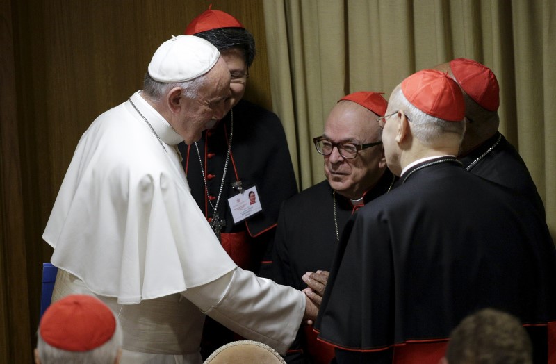 REUTERS  Max Rossi Pope Francis talks with cardinals as he leads the synod on the family in the Synod hall at the Vatican