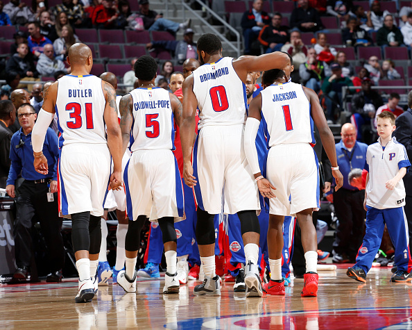 Kentavious Caldwell Pope #5 Andre Drummond #0 and Reggie Jackson #1 of the Detroit Pistons