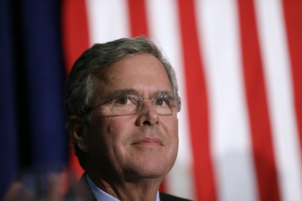 Republican presidential candidate Jeb Bush waits on stage in Davenport Iowa