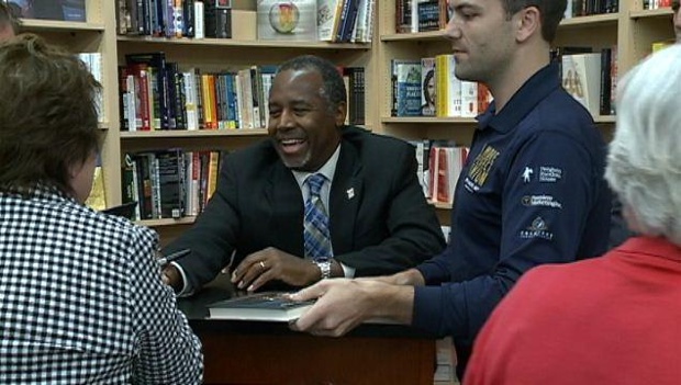 Republican presidential hopeful Ben Carson stopped in Omaha on Friday night to sign books at the Book Worm Shop