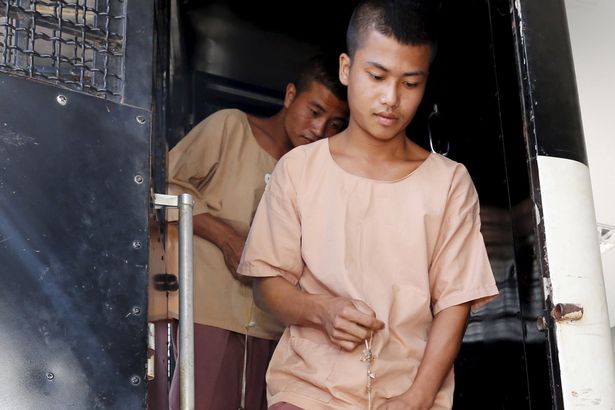 Myanmar migrant workers Zaw Lin and Win Zaw Htun arrive at the Koh Samui Provincial Court in Koh Samui Thailand