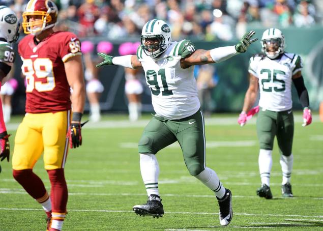 Sheldon Richardson celebrates as he records half a sack on Washington QB Kirk Cousins