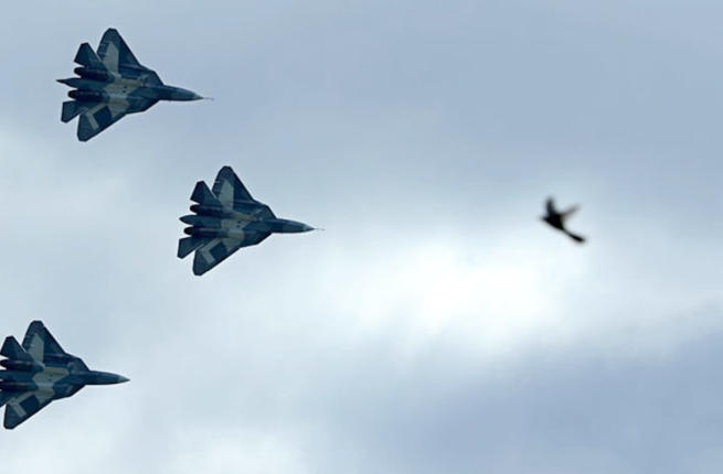 Russia's stealth fighters T-50 perform during the MAKS-2013 the International Aviation and Space Show in Zhukovsky outside Moscow