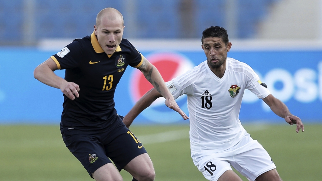 A spirited Jordan side have stunned Australia 2-0 to go top of their World Cup qualifying group