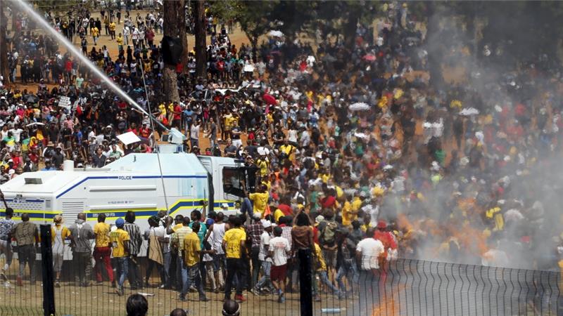 South African police shot tear gas and rubber bullets into the crowd shortly after the announcement of the embargo