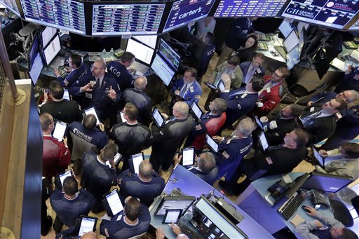 Traders gather at the post that handles Allergan on the floor of the New York Stock Exchange,Thursday Oct. 29 2015. Allergan which makes Botox jumped 8 percent after saying it has held talks with Pfizer about a sale