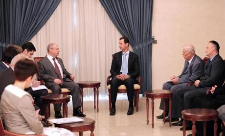 Syrian Arab News Agency showed President Bashar Assad meeting Sunday with Russian parliamentarians and social figures