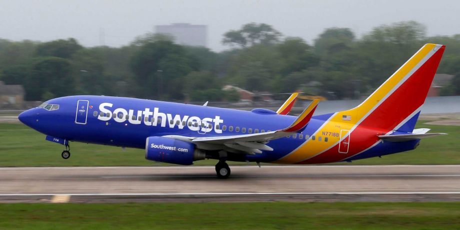 Southwest airlines jet takes off from a runway at Love Field in Dallas. Southwest Airlines is asking travelers on Sunday Oct. 11 to arrive at least two hours before their scheduled departures as technical issu