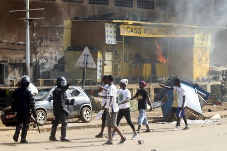 Clashes in Guinea between opposition, ruling party supporters kill 1, injure