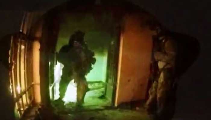 The video shows a reported US raid on an ISIS compound in which 70 hostages were freed